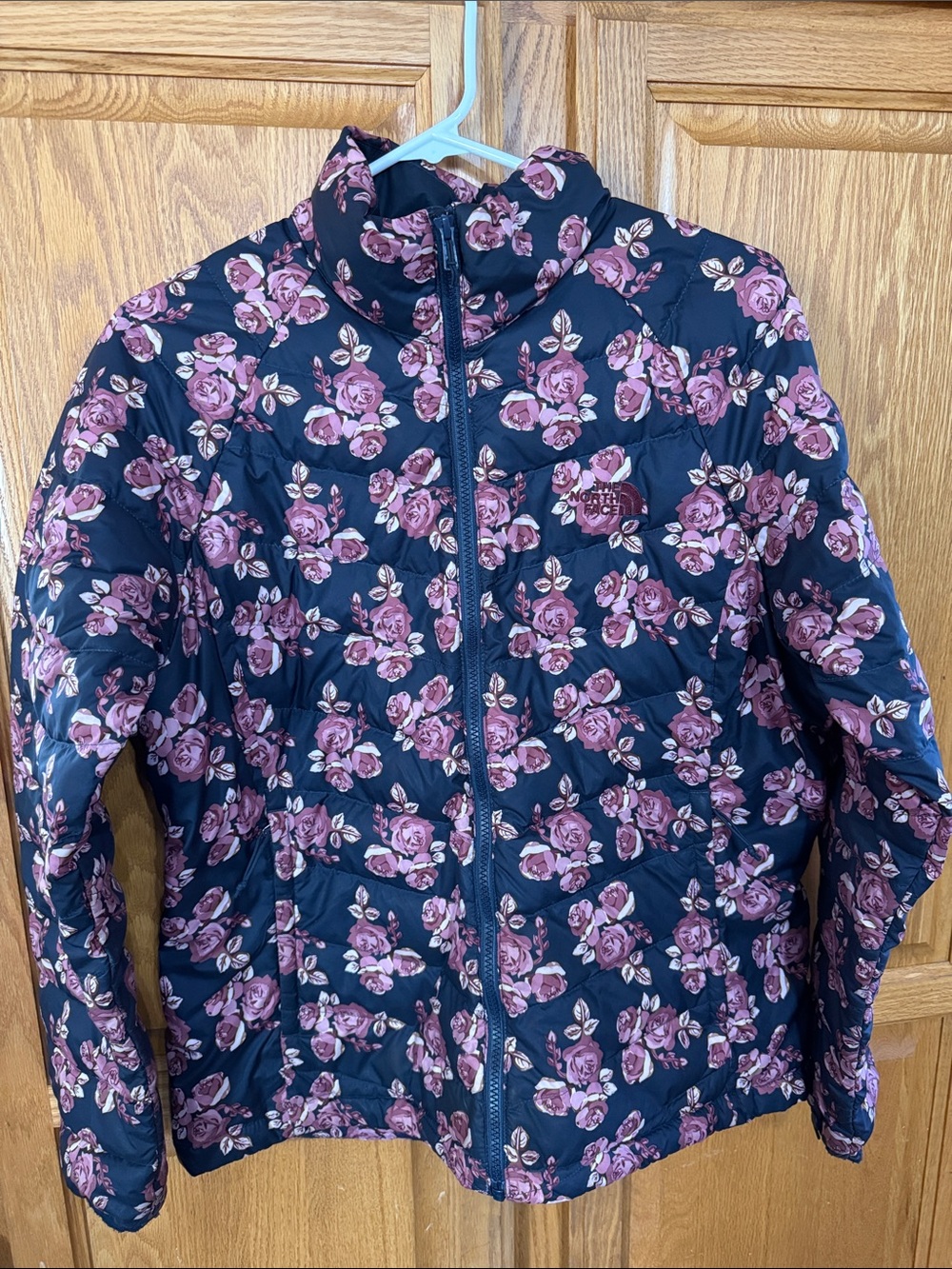 The North Face Women's Black Puffer Jacket with Pink Floral Print